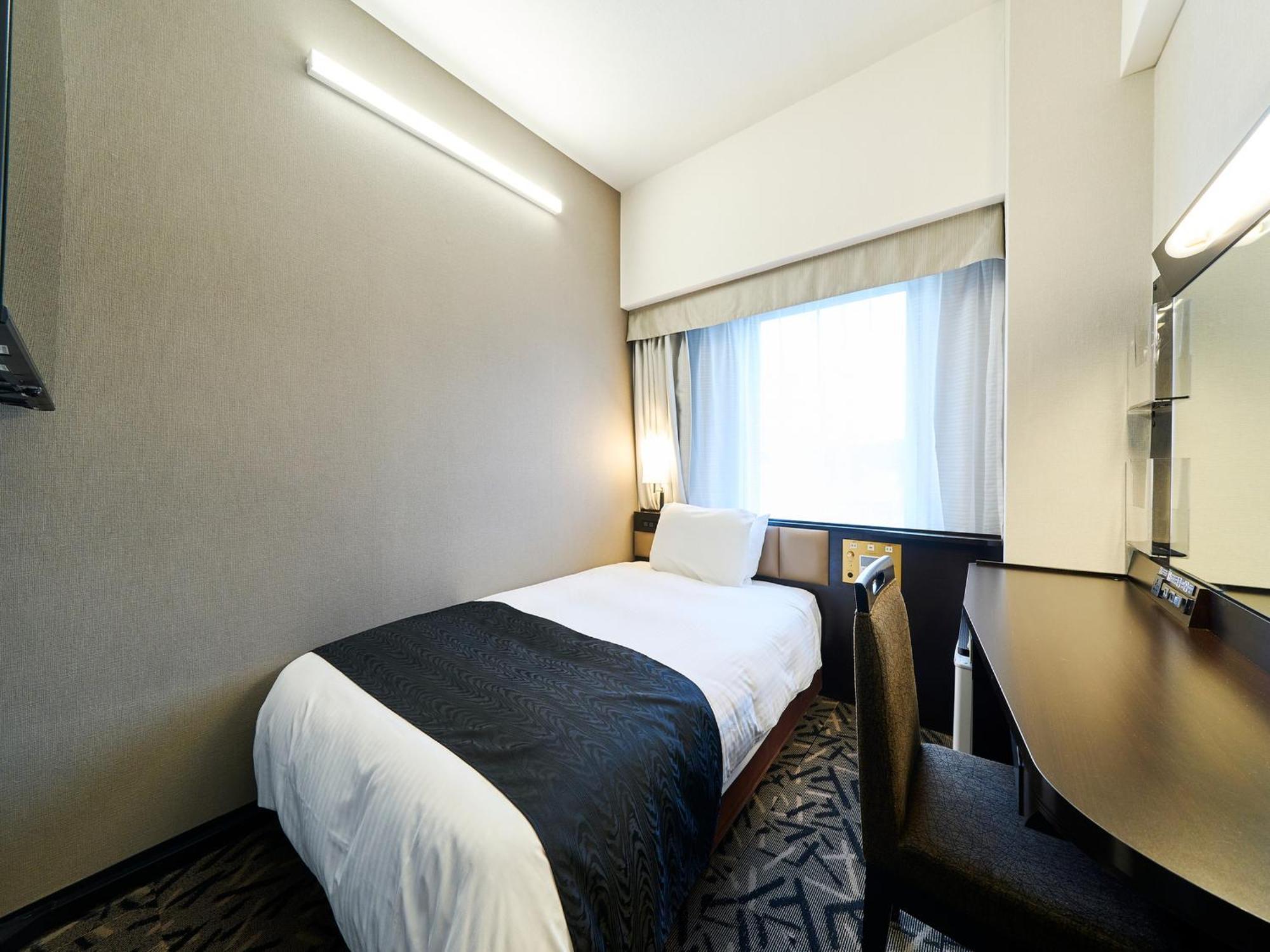 Apa Hotel Takaoka Marunouchi Kültér fotó