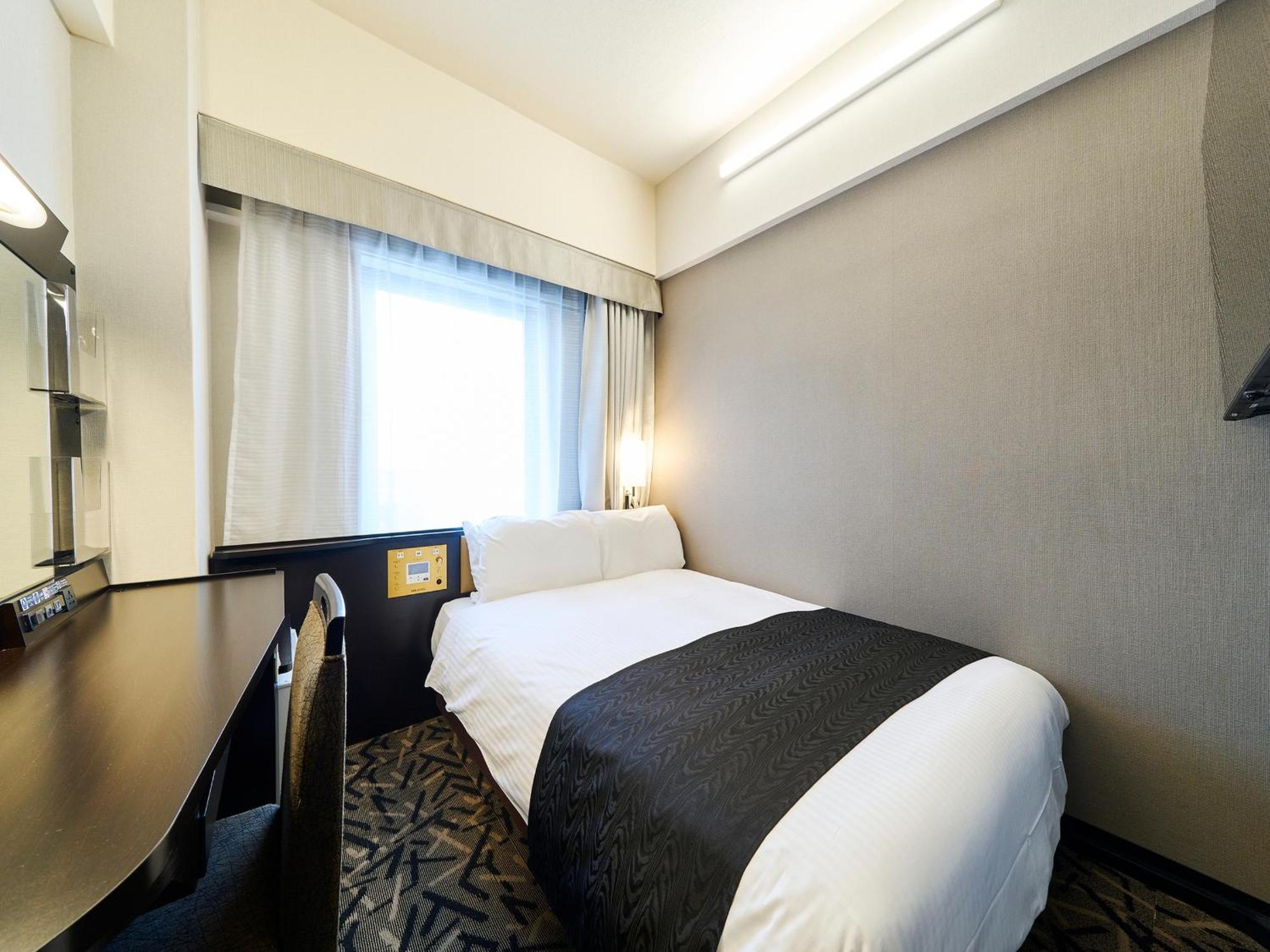 Apa Hotel Takaoka Marunouchi Kültér fotó